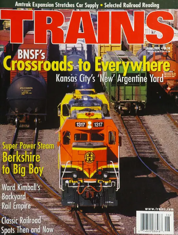 Magazine cover showing locomotive in train yard